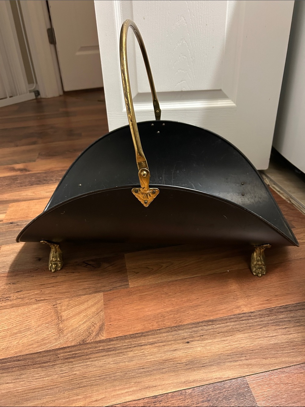 Vintage black metal brass MCM footed log holder firewood holder gold claw feet